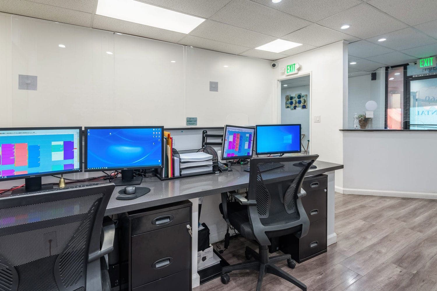 The front desk at 360 Dental, scheduling screens in view