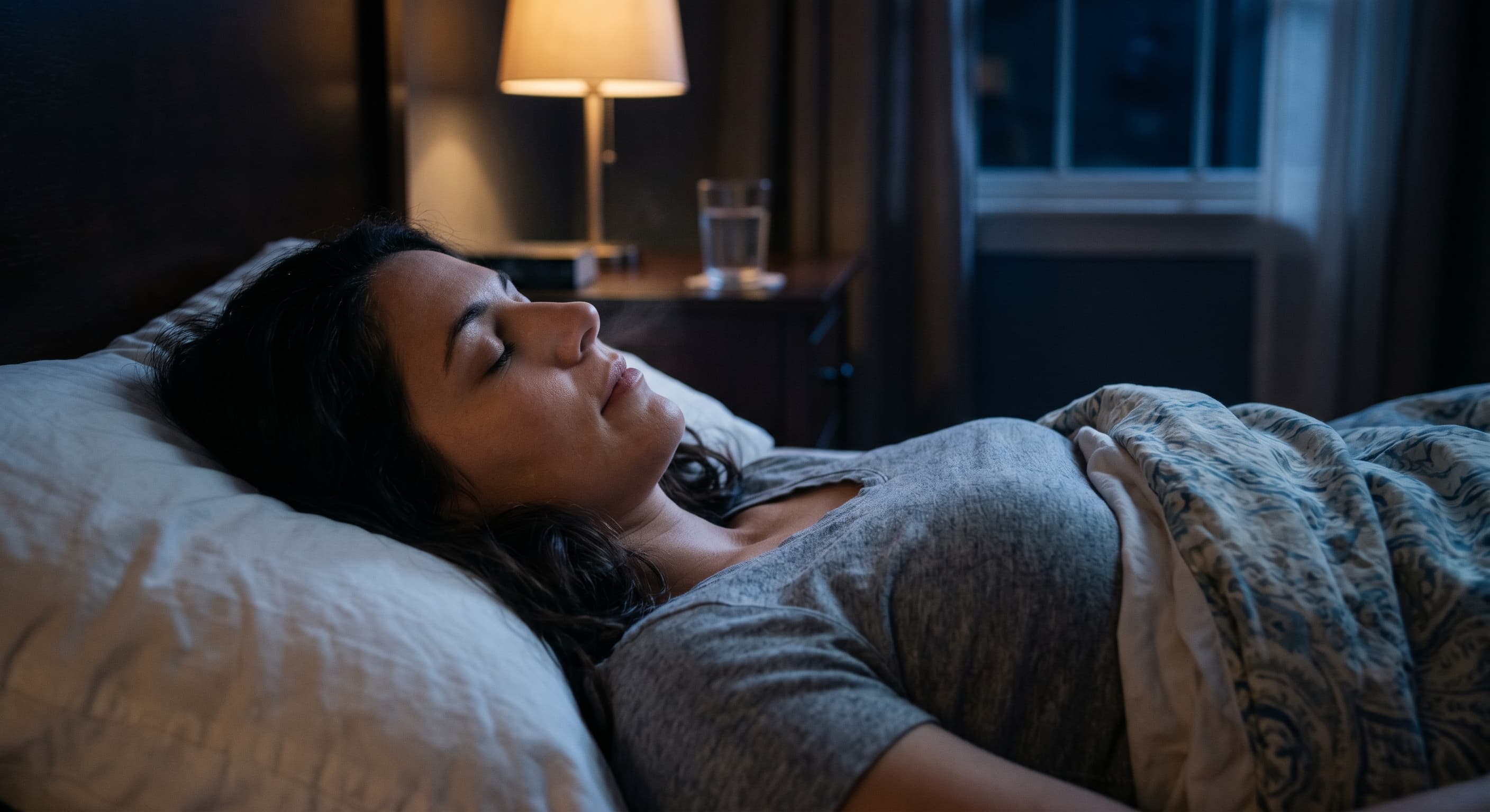 Person Sleeping Peacefully in Bed Nasal Breathing Night Scene